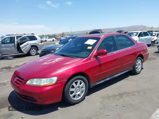 2002 Honda Accord SE z VIN 1HGCG56742A087457, wystawiony jako IAAI lot #42397581 z przebiegiem 187 534 mil mil oraz . Historia ofert i sprzedaży dostępna na DreamBid. Obrazek 17.