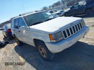 1997 Jeep Grand Cherokee Limited with VIN 1J4GZ78S9VC667698, listed as a IAAI auction lot 41671571 with 191,448 mi miles and . Bid and sale history available at DreamBid. Image 1.
