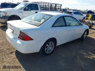 2003 Honda Civic EX with VIN 1HGEM22933L062174, listed as a IAAI auction lot 42024613 with 212,905 mi miles. Bid and sale history available at carsss.com. Image 4.