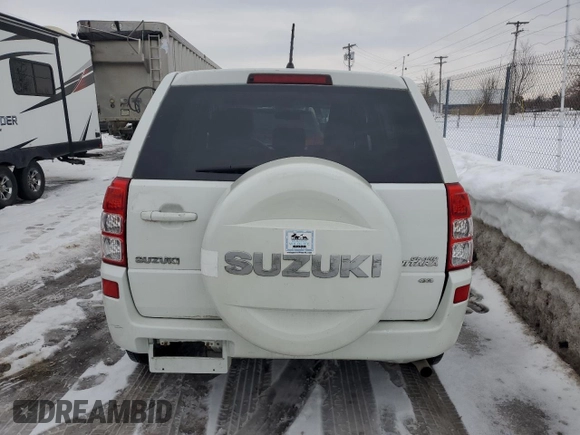 2011 Suzuki Grand Vitara Premium with VIN JS3TD0D27B4102552, listed as a Copart auction lot 47579575 with 115,534 mi miles and Clean title. Bid and sale history available at DreamBid. Image 6.