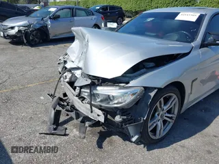 2014 BMW 4 Series 428i xDrive with VIN WBA3N9C54EF721188, listed as a IAAI auction lot 42143305 with Not provided miles and . Bid and sale history available at DreamBid. Image 16.