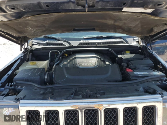 2008 Jeep Commander Overland z VIN 1J8HG68268C235609, wystawiony jako Copart lot #53258215 z przebiegiem 180 959 mil mil oraz Szkoda całkowita • Salvage title. Historia ofert i sprzedaży dostępna na DreamBid. Obrazek 12.