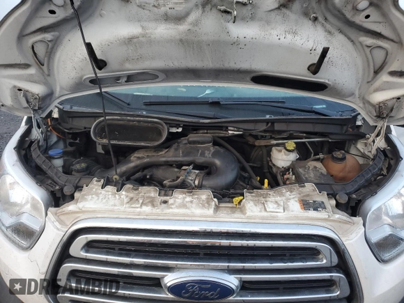 2019 Ford Transit with VIN 1FTYR1ZM6KKB01524, listed as a Copart auction lot 87309434 with 74,696 mi miles and Salvage Title. Bid and sale history available at DreamBid. Image 12.