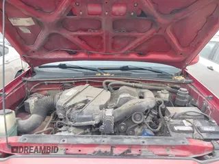 2010 Toyota Tacoma PreRunner z VIN 3TMJU4GN1AM094552, wystawiony jako IAAI lot #42422207 z przebiegiem 180 364 mil mil oraz . Historia ofert i sprzedaży dostępna na DreamBid. Obrazek 10.