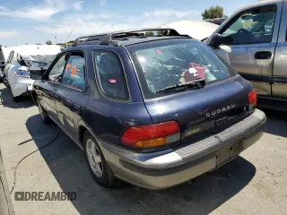 1996 Subaru Impreza Outback with VIN JF1GF4851TG811571, listed as a Copart auction lot 65650514 with 248,315 mi miles and Salvage title. Bid and sale history available at DreamBid. Image 2.