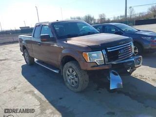 2011 Ford F-150 XL with VIN 1FTFX1EF1BFC03827, listed as a IAAI auction lot 42043213 with 145,408 mi miles. Bid and sale history available at carsss.com. Image 1.