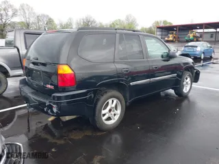 2007 GMC Envoy SLE with VIN 1GKDS13S872309605, listed as a IAAI auction lot 41946509 with 184,638 mi miles. Bid and sale history available at carsss.com. Image 4.