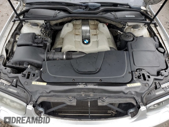 2004 BMW 7 Series 745i with VIN WBAGL634X4DP70421, listed as a Copart auction lot 73309744 with 123,457 mi miles and Salvage Title. Bid and sale history available at DreamBid. Image 11.
