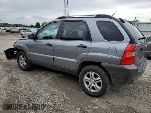 2005 Kia Sportage LX with VIN KNDJF723057062113, listed as a Copart auction lot 66630164 with 129,715 mi miles and Salvage Title. Bid and sale history available at carsss.com. Image 2.