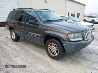 2004 Jeep Grand Cherokee Laredo z VIN 1J4GX48N74C412982, wystawiony jako IAAI lot #41496258 z przebiegiem 195 671 mil mil oraz . Historia ofert i sprzedaży dostępna na DreamBid. Obrazek 1.