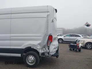 2022 Ford Transit Cargo with VIN 1FTBR2X83NKA80895, listed as a IAAI auction lot 41905179 with 45,241 mi miles and . Bid and sale history available at DreamBid. Image 17.
