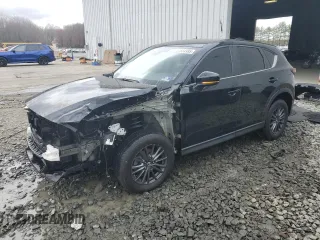 2019 Mazda CX-5 Sport with VIN JM3KFBBM2K0507463, listed as a Copart auction lot 51584995 with 52,062 mi miles and Salvage Title. Bid and sale history available at carsss.com. Image 1.