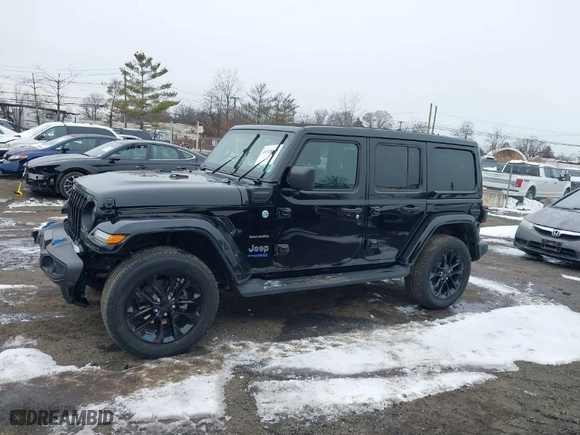 2022 Jeep Wrangler 4xe Unlimited Sahara with VIN 1C4JJXP66NW101035, listed as a IAAI auction lot 41528135 with 17,943 mi miles. Bid and sale history available at carsss.com. Image 14.