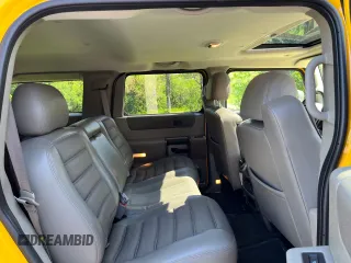 2003 Hummer H2 with VIN 5GRGN23UX3H112710, listed as a Copart auction lot 88229785 with 64,186 mi miles and Salvage Title. Bid and sale history available at carsss.com. Image 6.