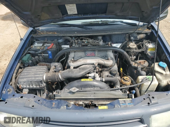 2004 Chevrolet Tracker ZR2 z VIN 2CNBJ734346903751, wystawiony jako Copart lot #59300765 z przebiegiem 126 924 mil mil oraz Szkoda całkowita • Salvage title. Historia ofert i sprzedaży dostępna na DreamBid. Obrazek 12.
