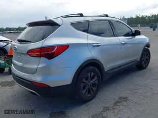 2014 Hyundai Santa Fe Sport with VIN 5XYZU3LB0EG198641, listed as a IAAI auction lot 41673814 with 113,027 mi miles. Bid and sale history available at carsss.com. Image 4.