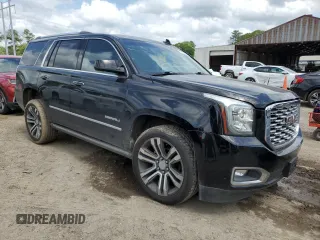 2019 GMC Yukon Denali with VIN 1GKS1CKJ0KR259491, listed as a Copart auction lot 51071335 with 105,294 mi miles and Salvage Title. Bid and sale history available at carsss.com. Image 4.