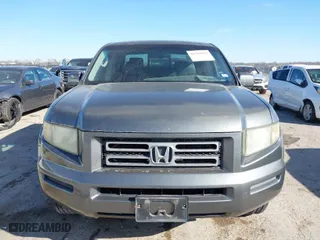 2007 Honda Ridgeline RTL w/Leather with VIN 2HJYK16547H526249, listed as a IAAI auction lot 41769625 with 173,168 mi miles. Bid and sale history available at carsss.com. Image 12.