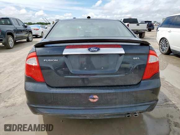 2012 Ford Fusion SEL z VIN 3FAHP0JA5CR258594, wystawiony jako Copart lot #60868635 z przebiegiem 162 274 mil mil oraz Czysty tytuł • Clean title. Historia ofert i sprzedaży dostępna na DreamBid. Obrazek 6.