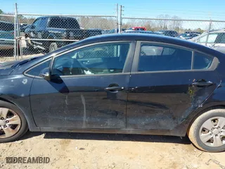 2015 Kia Forte LX with VIN KNAFX4A69F5268750, listed as a IAAI auction lot 41733802 with 234,049 mi miles. Bid and sale history available at carsss.com. Image 14.