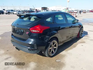 2018 Ford Focus ST with VIN 1FADP3L95JL332577, listed as a IAAI auction lot 41748222 with 73,491 mi miles and . Bid and sale history available at DreamBid. Image 4.
