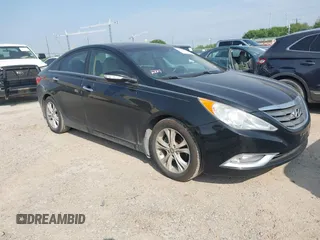 2012 Hyundai Sonata SE z VIN 5NPEC4AC2CH432299, wystawiony jako IAAI lot #41949415 z przebiegiem 116 996 mil mil oraz . Historia ofert i sprzedaży dostępna na DreamBid. Obrazek 1.