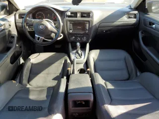 2011 Volkswagen Jetta SE with VIN 3VWDX7AJ2BM013018, listed as a Copart auction lot 73686974 with 145,557 mi miles and Salvage title. Bid and sale history available at DreamBid. Image 8.