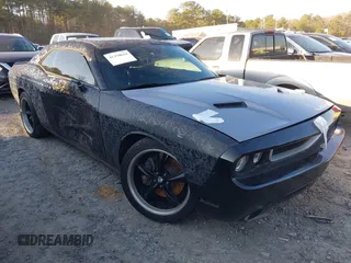 2016 Dodge Challenger R/T Scat Pack z VIN 2C3CDZFJ5GH177997, wystawiony jako IAAI lot #41470614 z przebiegiem 52 728 mil mil oraz . Historia ofert i sprzedaży dostępna na DreamBid. Obrazek 13.