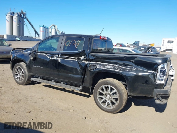 2021 GMC Canyon 4WD Denali z VIN 1GTG6EEN9M1240596, wystawiony jako IAAI lot #40760124 z przebiegiem 52 985 mil mil oraz . Historia ofert i sprzedaży dostępna na DreamBid. Obrazek 20.
