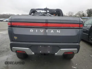 2022 Rivian R1T Adventure z VIN 7FCTGAAA5NN014020, wystawiony jako Copart lot #81367764 z przebiegiem Nie podano mil oraz Szkody całkowita. Historia ofert i sprzedaży dostępna na DreamBid. Obrazek 6.