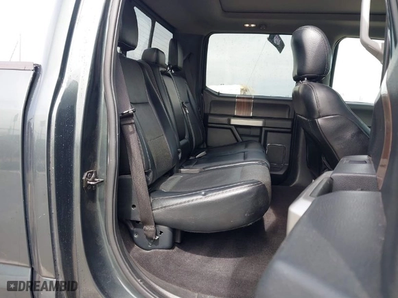 2015 Ford F-150 XLT w/HD Payload Pkg with VIN 1FTFW1EG6FFB62533, listed as a IAAI auction lot 41828378 with 130,033 mi miles. Bid and sale history available at carsss.com. Image 8.