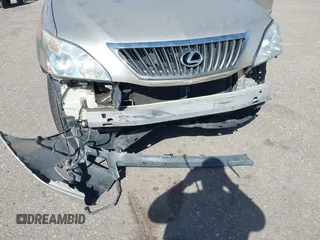 2008 Lexus RX with VIN 2T2HK31U38C057662, listed as a IAAI auction lot 41977657 with 178,847 mi miles. Bid and sale history available at carsss.com. Image 6.
