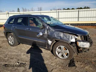 2013 Jeep Grand Cherokee Overland with VIN 1C4RJFCG0DC607214, listed as a Copart auction lot 43672575 with 188,026 mi miles and Salvage Title. Bid and sale history available at carsss.com. Image 4.