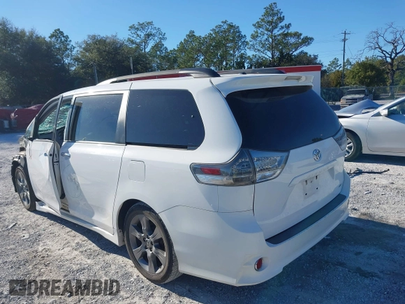 2014 Toyota Sienna SE with VIN 5TDXK3DC4ES487772, listed as a IAAI auction lot 41218295 with 153,368 mi miles and . Bid and sale history available at DreamBid. Image 3.