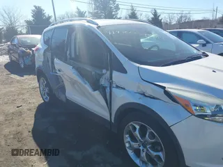 2016 Ford Escape Titanium with VIN 1FMCU9J96GUB65441, listed as a IAAI auction lot 41412223 with 74,218 mi miles. Bid and sale history available at carsss.com. Image 6.