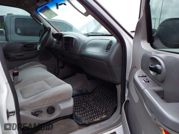 2002 Ford F-150 XLT with VIN 1FTRW08L02KE29411, listed as a IAAI auction lot 42133550 with 270,752 mi miles. Bid and sale history available at carsss.com. Image 5.