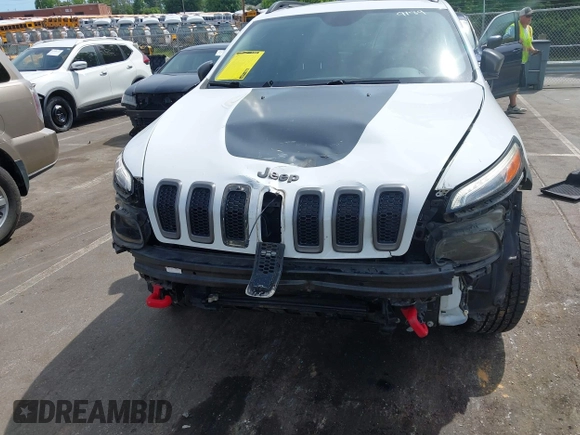 2016 Jeep Cherokee Trailhawk z VIN 1C4PJMBS7GW109189, wystawiony jako IAAI lot #42219470 z przebiegiem 115 197 mil mil oraz . Historia ofert i sprzedaży dostępna na DreamBid. Obrazek 11.