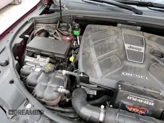 2018 Jeep Grand Cherokee High Altitude z VIN 1C4RJFCM9JC405344, wystawiony jako Copart lot #82923474 z przebiegiem 34 212 mil mil oraz Szkoda całkowita • Salvage title. Historia ofert i sprzedaży dostępna na DreamBid. Obrazek 14.