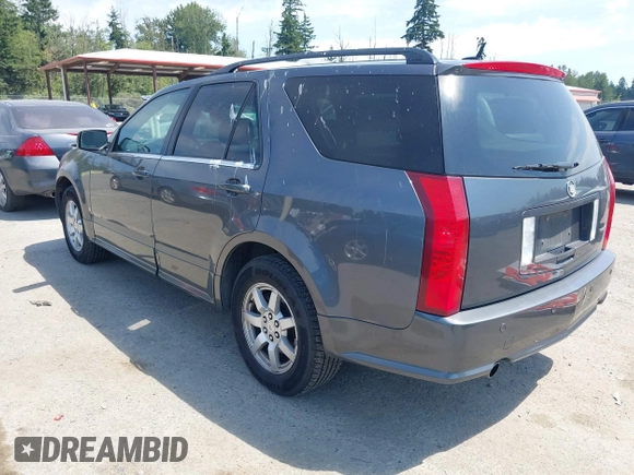 2008 Cadillac SRX RWD z VIN 1GYEE637180205948, wystawiony jako IAAI lot #42487005 z przebiegiem 203 458 mil mil oraz . Historia ofert i sprzedaży dostępna na DreamBid. Obrazek 3.