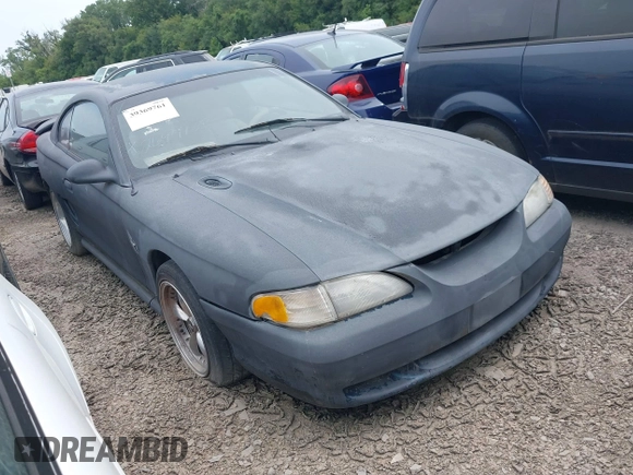 1997 Ford Mustang with VIN 1FALP4043VF158166, listed as a IAAI auction lot 39369761 with 124,992 mi miles. Bid and sale history available at carsss.com. Image 1.