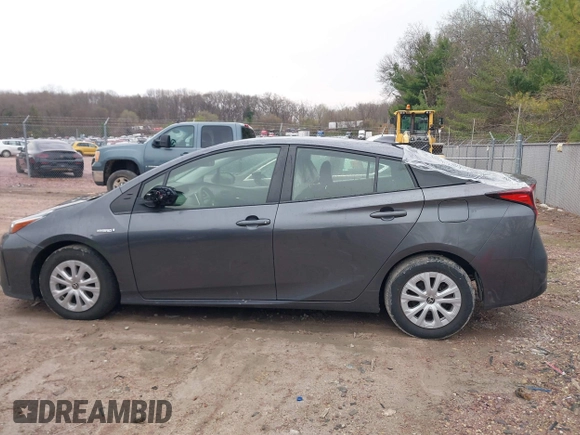 2021 Toyota Prius L Eco with VIN JTDKAMFU6M3140081, listed as a IAAI auction lot 42131187 with 103,973 mi miles and . Bid and sale history available at DreamBid. Image 14.