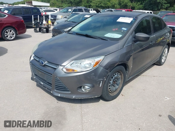 2012 Ford Focus SE z VIN 1FAHP3F24CL294391, wystawiony jako IAAI lot #42545359 z przebiegiem 190 904 mil mil oraz . Historia ofert i sprzedaży dostępna na DreamBid. Obrazek 6.