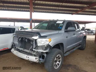 2016 Toyota Tundra 4WD Truck SR5 with VIN 5TFDW5F11GX566571, listed as a IAAI auction lot 41789354 with 122,493 mi miles. Bid and sale history available at carsss.com. Image 2.