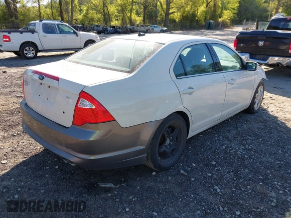 2012 Ford Fusion SE with VIN 3FAHP0HA9CR402640, listed as a IAAI auction lot 42052610 with 210,441 mi miles and . Bid and sale history available at carsss.com. Image 4.