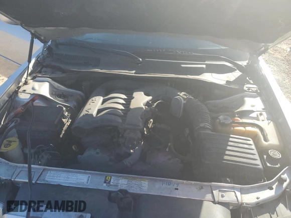 2009 Chrysler 300 z VIN 2C3KK53V09H568544, wystawiony jako Copart lot #47015735 z przebiegiem 126 245 mil mil oraz Szkoda całkowita • Salvage title. Historia ofert i sprzedaży dostępna na DreamBid. Obrazek 11.