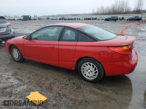 2002 Saturn SC z VIN 1G8ZY12752Z308435, wystawiony jako Copart lot #85364214 z przebiegiem 112 649 mil mil oraz Tytuł czysty. Historia ofert i sprzedaży dostępna na DreamBid. Obrazek 2.