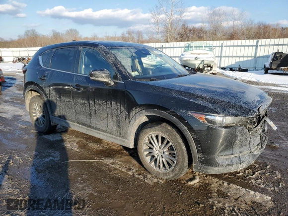 2017 Mazda CX-5 Touring with VIN JM3KFBCL0H0148970, listed as a Copart auction lot 42413605 with 57,776 mi miles and Salvage Title. Bid and sale history available at carsss.com. Image 4.