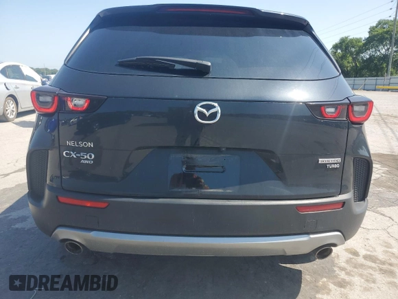 2023 Mazda CX-50 Meridian Edition with VIN 7MMVABXYXPN117298, listed as a Copart auction lot 61474695 with 42,738 mi miles and Salvage title. Bid and sale history available at DreamBid. Image 6.