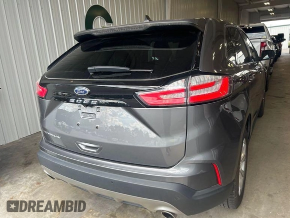 2021 Ford Edge Titanium z VIN 2FMPK3K97MBA51131, wystawiony jako IAAI lot #42529673 z przebiegiem 92 302 mil mil oraz . Historia ofert i sprzedaży dostępna na DreamBid. Obrazek 4.
