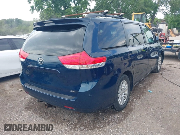 2011 Toyota Sienna XLE AAS with VIN 5TDYK3DC6BS045303, listed as a IAAI auction lot 42515203 with 205,904 mi miles and . Bid and sale history available at DreamBid. Image 4.